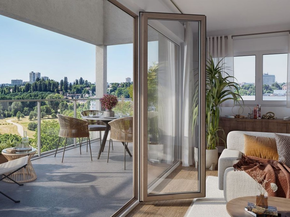 Perspective du programme immobilier neuf Flânerie Saint-Martin à Rennes : façade contemporaine à loggias en lisière de parc
